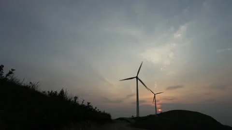 Wind turbines rotating on hill Video stock 22149041