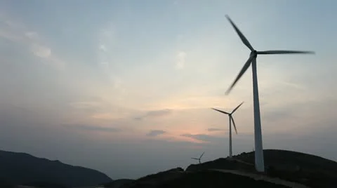 Wind turbines rotating on hill Stock Footage 22149165