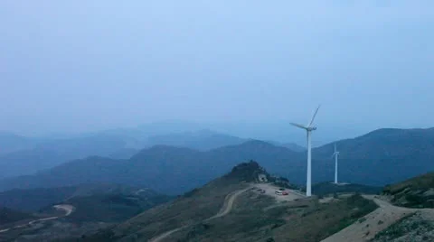Wind turbines rotating on hill Video stock 22149470