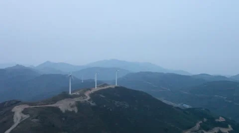 Wind turbines rotating on hill Video stock 22149604