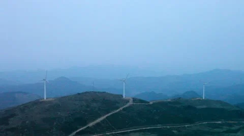 Wind turbines rotating on hill Vídeo Stock 22150265