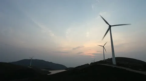 Wind turbines rotating on hill Stock Footage 22150707