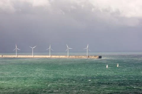 Wind turbines on sea Stock Photos