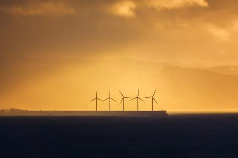 Wind turbines on the sea Stock Photos