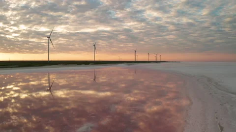 Wind turbines on the seashore at sunset. Green energy concept. 스톡 동영상 148086409