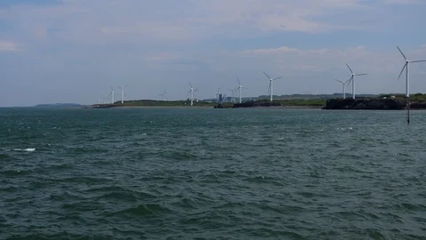 Wind turbines on the seaside Видео 90879571