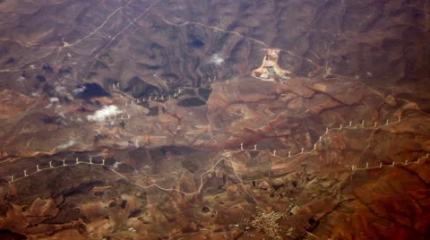 Wind Turbines Seen from an Airplane Window I Stock Footage 40009280