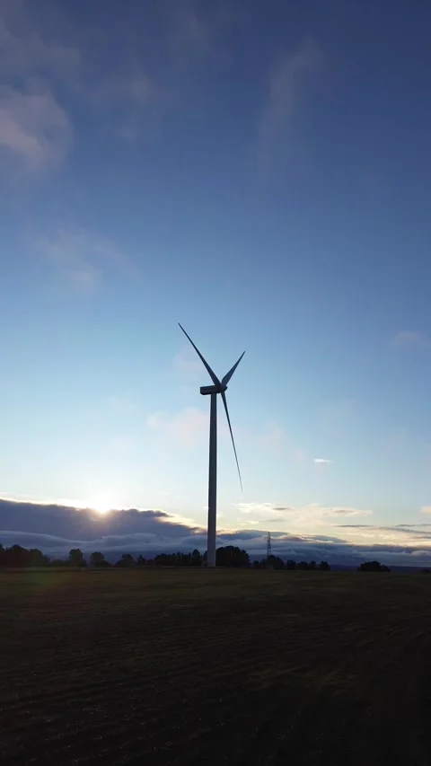Wind Turbines Silhouette at Sunset with Clouds – Renewable Energy Concept Stock Footage 324624247