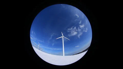Wind Turbines, Snowfields, and Rays of Sunlight, Fisheye Stock-Footage 324960132