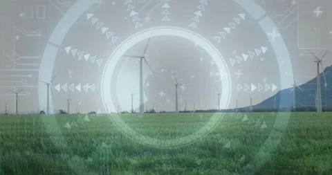Wind turbines spanning grassy plain receiving sensor input HUD overlay mapping Stock Footage 334034588