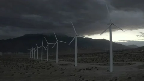 Wind Turbines spin by the Mountains Stock Footage 160927266