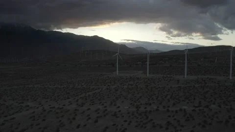 Wind Turbines Spin by Mountains Stock Footage 160927888