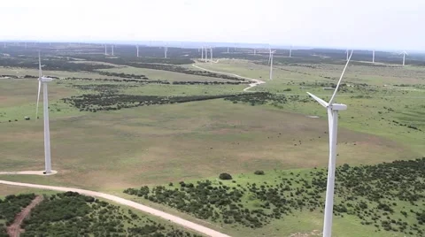 Wind Turbines Spin Texas Wind Farm Pasture Aerial Helicopter Stock Video Footage Stock Footage 1853478