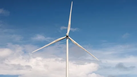 Wind Turbines Spinning Under Clear Blue Sky 스톡 동영상 308916961
