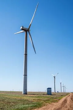 Wind turbines in the spring steppe Stock Photos