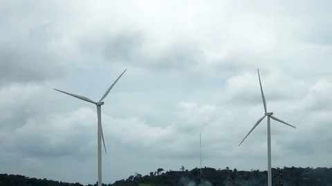 Wind turbines on sunny morning Stock Footage 117333853