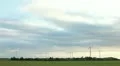 Wind turbines on sunrise - renewable energy source HD Footage