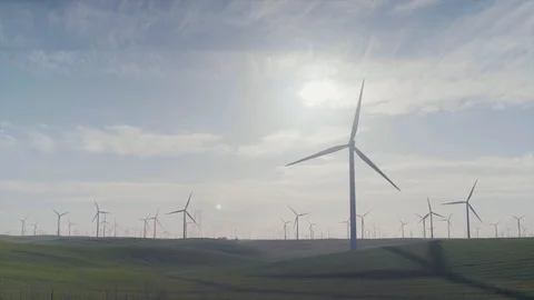 Wind Turbines at Sunset // 4K Stock Footage
