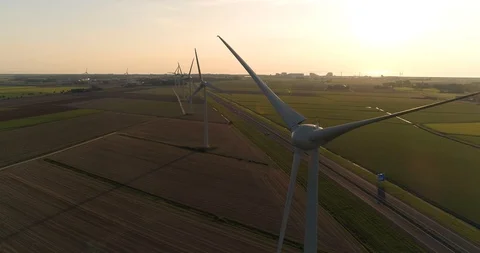 Wind Turbines, Sunset, Dutch Highway -  Friesland, The Netherlands – 4K Drone Stock Footage 123710067
