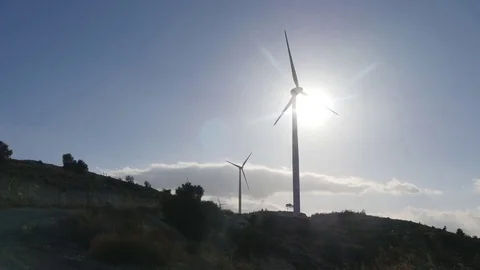 Wind turbines on the sunset Stock Footage 73521659