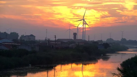 Wind Turbines at sunset Stock Footage