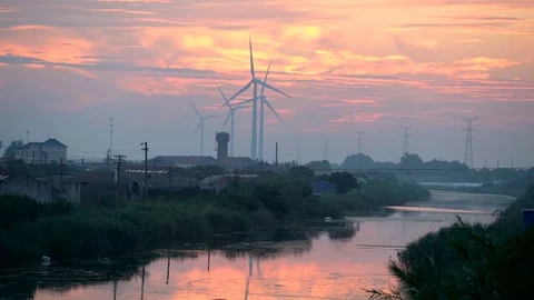 Wind Turbines at sunset Видео 78149211