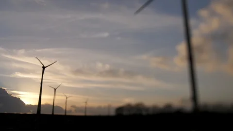 Wind turbines sunset Stock Footage 100192569