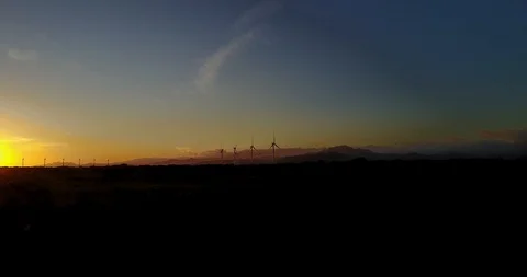 Wind turbines sunset Stock Footage 107278176