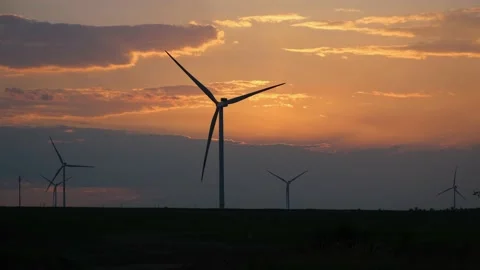 Wind turbines at sunset Stock Footage 198799553