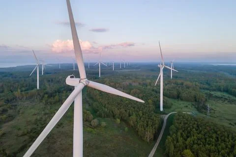 Wind turbines on sunset Stock Photos