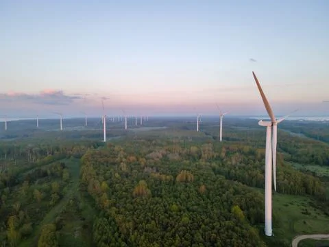 Wind turbines on sunset Stock Photos