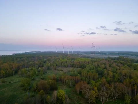 Wind turbines on sunset Stock Photos