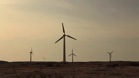 Wind turbines at sunset sky background Vídeo Stock 71761241
