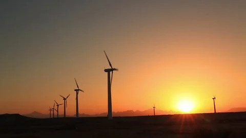 Wind turbines at sunset sky background Vidéo 75252234