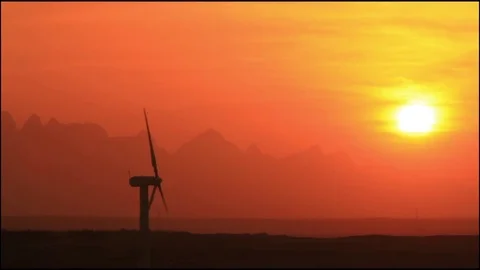 Wind turbines at sunset sky background 库存影片 75252491