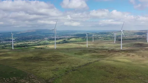 Wind turbines track back Haslingden Lancashire green energy Stock Footage 136597298