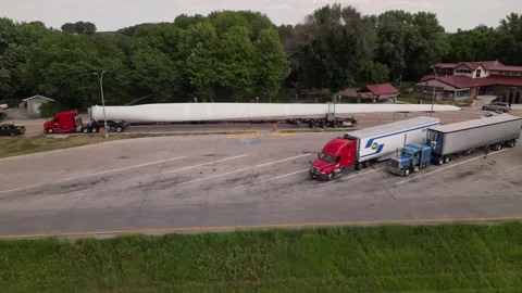Wind turbines transportation. oversize load Stock Footage 247232874