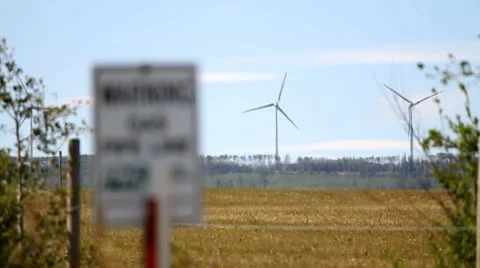 Wind turbines turning in background Stock Footage 10749124