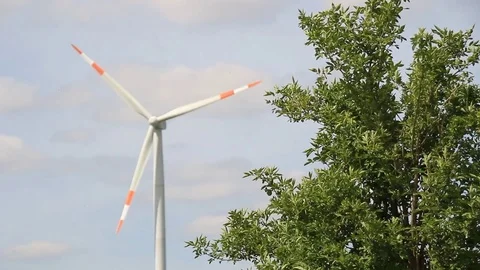 Wind turbines turning on a beutifull spring day Stock Footage 75535875