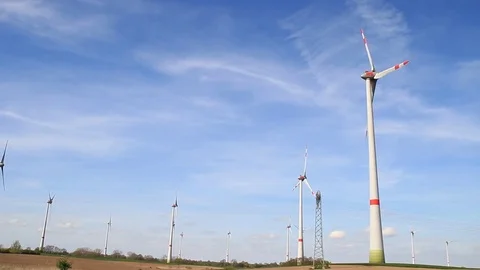 Wind turbines turning on a beutifull spring day Stock Footage 75545650