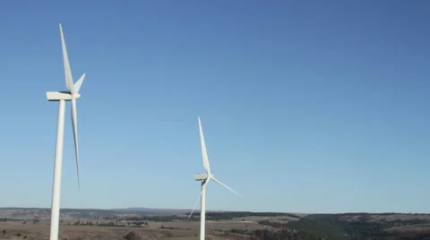 Wind turbines turning slowly on a crisp fall morning 스톡 동영상 32244699