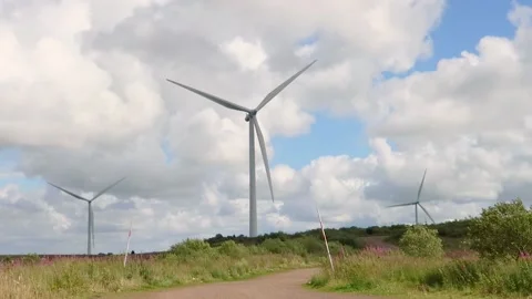 Wind Turbines turning in strong winds at Whitelee Wind Farm, Scotland Video stock 205025744