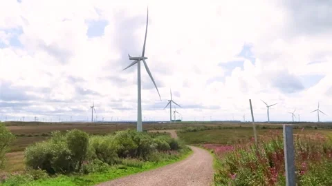 Wind Turbines turning in strong winds at Whitelee Wind Farm, Scotland Stock Footage 205025783