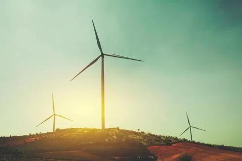 Wind turbines under the sky for technology concept. Wind turbines generating  Stock Photos