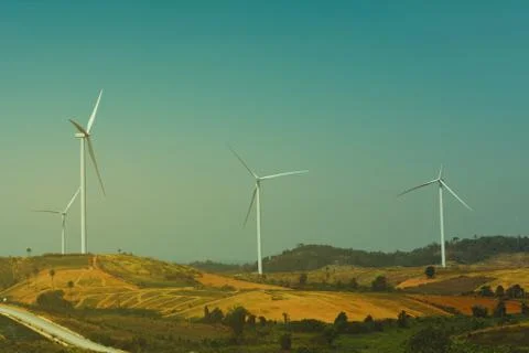Wind turbines under the sky for technology concept. Wind turbines generating  Stock Photos