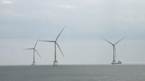 Wind turbines visible from Trump's golf course in Aberdeen Stock Footage 313882376
