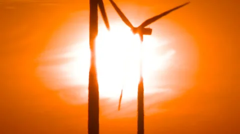 Wind Turbines on Wind Farm during Sunset Close Up Stock Footage 32937439