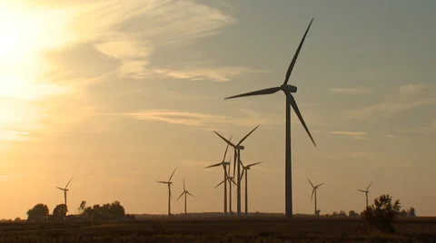 Wind Turbines on Wind Farm at Sunset Wide Shot Stock Footage 32936403