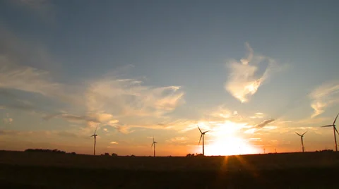Wind Turbines on Wind Farm at sunset Stock Footage 32937078