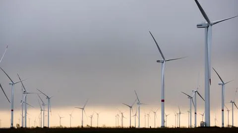 Wind Turbines, Wind Generators in dramatic sky, Northern Germany Stock Photos